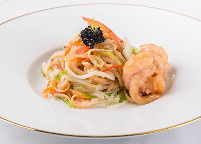 Braised E-fu Noodles with Chinese cabbage, Mushrooms and King Prawns from Crystal Dragon