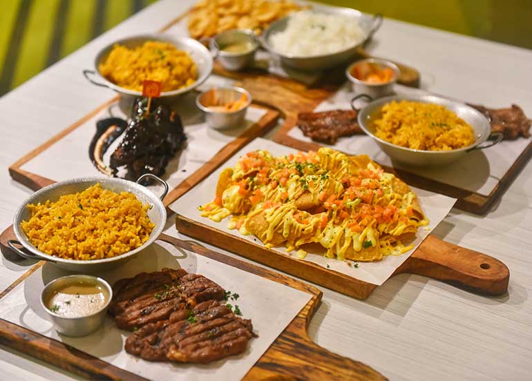 Steak, Ribs, and Nachos from Holy Grill