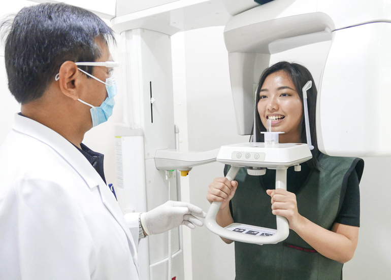 Teeth check-up on patient