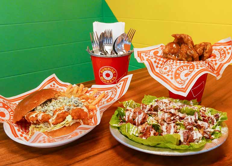 Buffalo Bleu Burger, 1/2 Jack Daniel Buffalo Wings, and Bacon Parmesan Salad from Sunrise Buckets