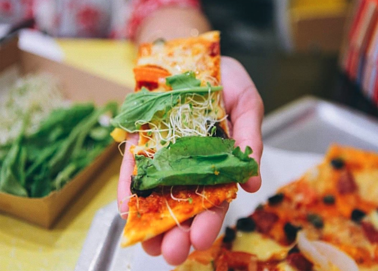 Original Dear Darla Pizza from Yellow Cab with Arugula and alfalfa sprouts