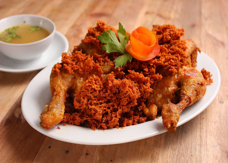 Crispy Fried Chicken on a plate with soup
