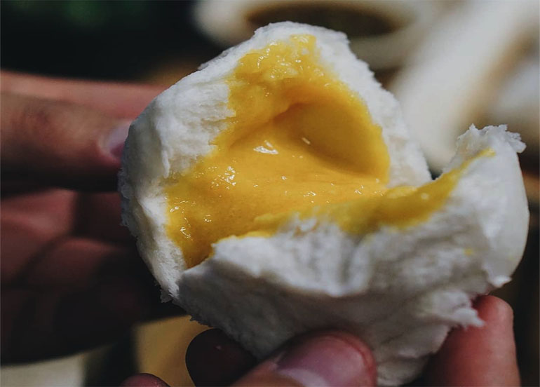 Egg custard dumpling with yellow filling inside