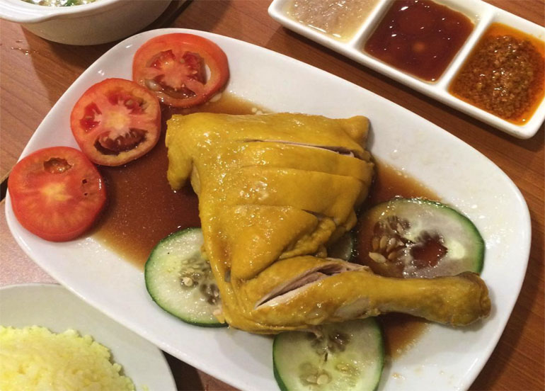Hainanese chicken set from Chomp Chomp with an assortment of sauces