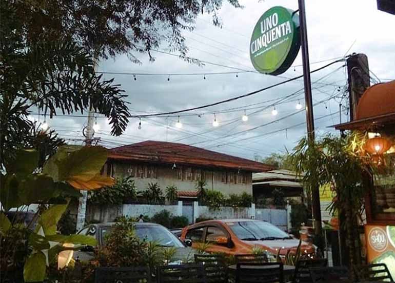 Uno Cinquenta Sign and Al Fresco Dining Area