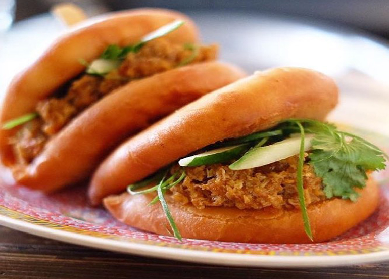 Chili Crab buns from Your local filled with cilantro, cucumber, and chili crab