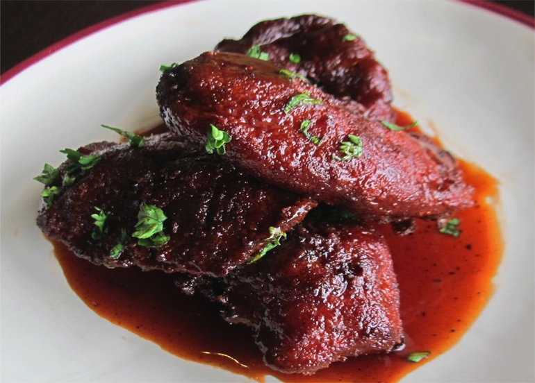 Chicken Wings topped with parsley