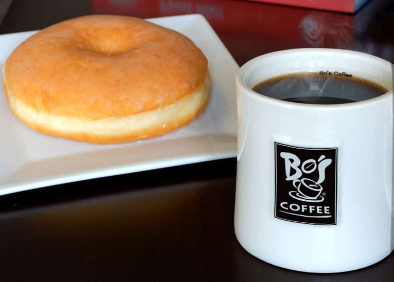 Bo's Coffee paired with a doughnut