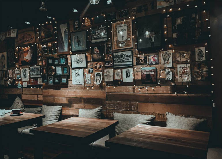 Ella and the Blackbird Interior filled with picture frames and fairy lights