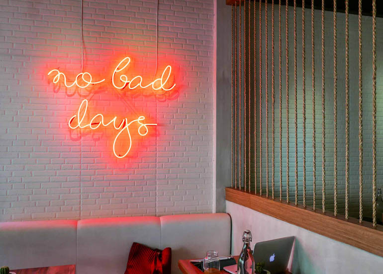 Common Folk Interior with neon sign