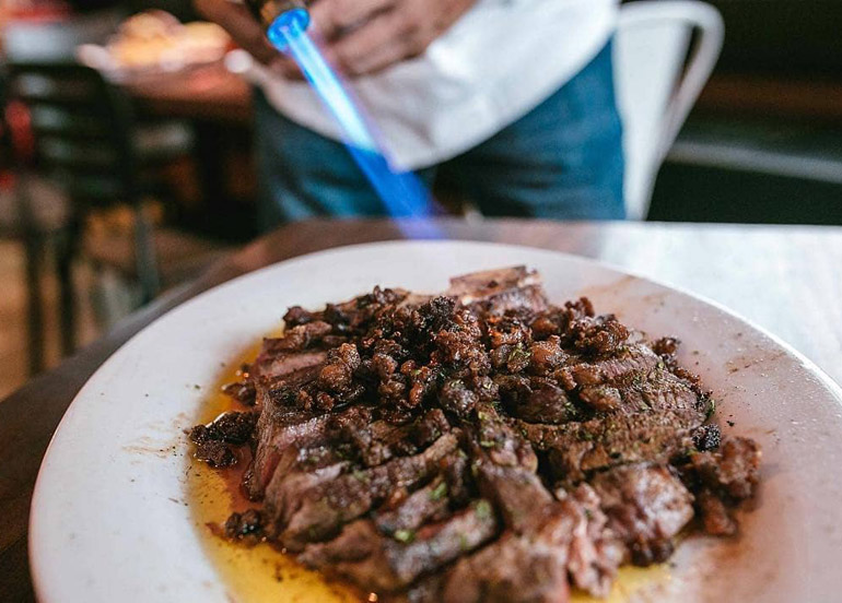 Hai Chix & Steaks torching beef
