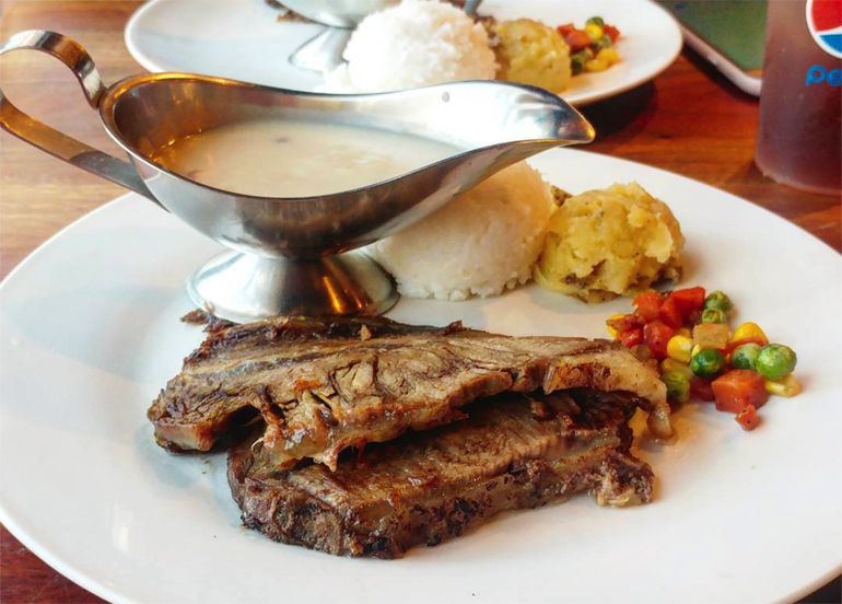Fat Cousins' Diner Roast Beef Slab with mashed potatoes, vegetables, and gravy