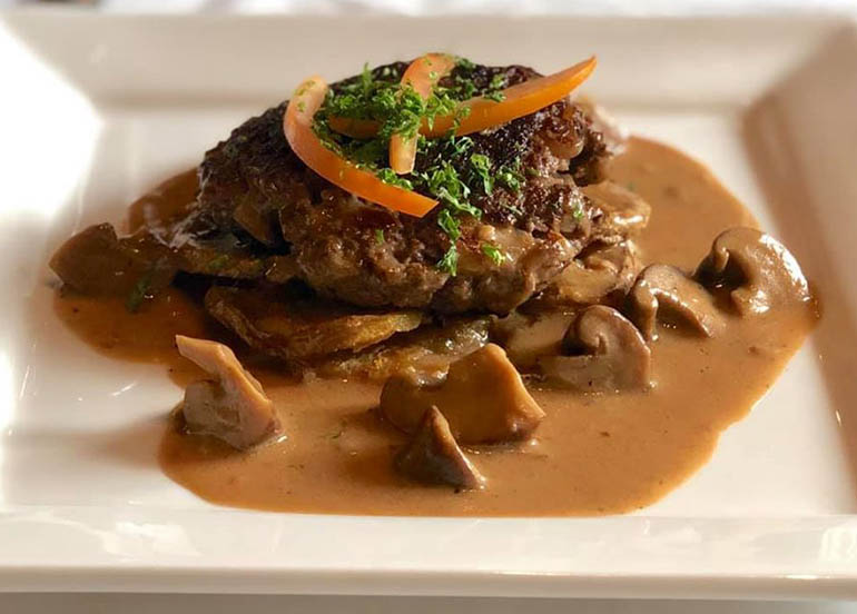 Grilled Beef Onglet Patty with Lyonnaise Potatoes and Mushroom Juice from Brasserie Sagana