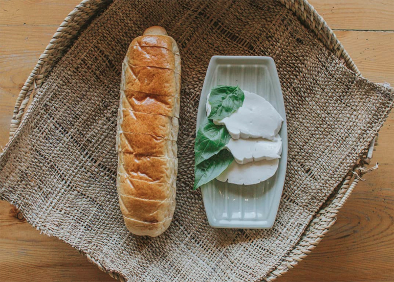 Ernie's Kamote Bread from Cafe by the Ruins with a side of spread