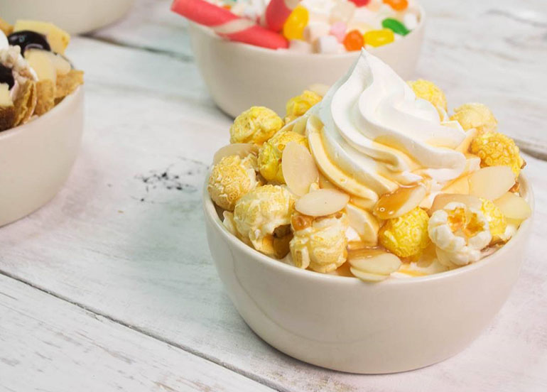 Movie Time Yogurt Combo (Caramel Popcorn, Sliced Almonds, Caramel) from The White Hat Yogurt