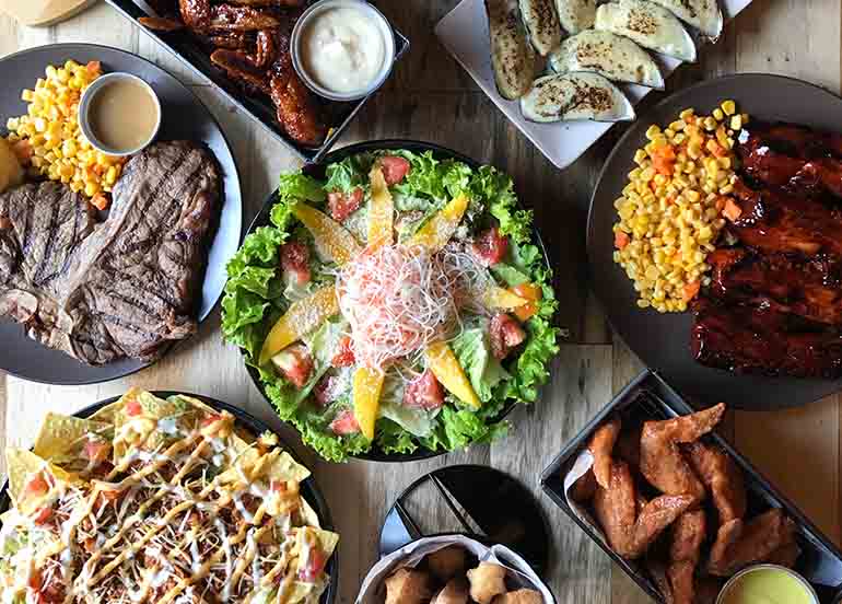 Steak, Salad, Wings, Ribs, and Nachos from Blake's Wings and Steaks