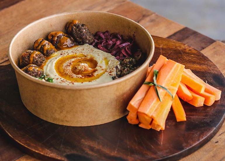 Hummus Bowl with Carrot Sticks from Medley Modern Mediterranean